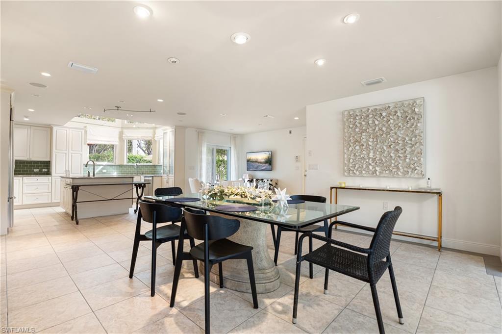 1980 Gordon Drive Naples, FL 34102 - Photo 6 of 14 a view of a dining room with furniture