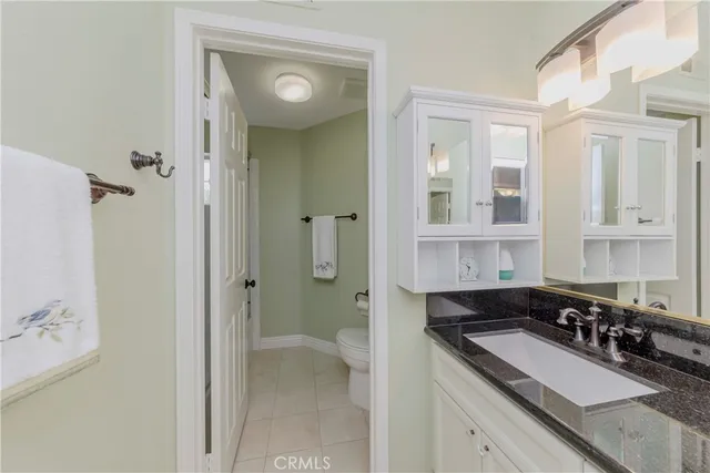 a view of a workspace with furniture and lounge chair
