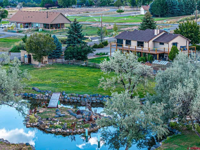 a aerial view of a house with garden