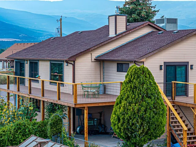 a backyard of a house with seating space