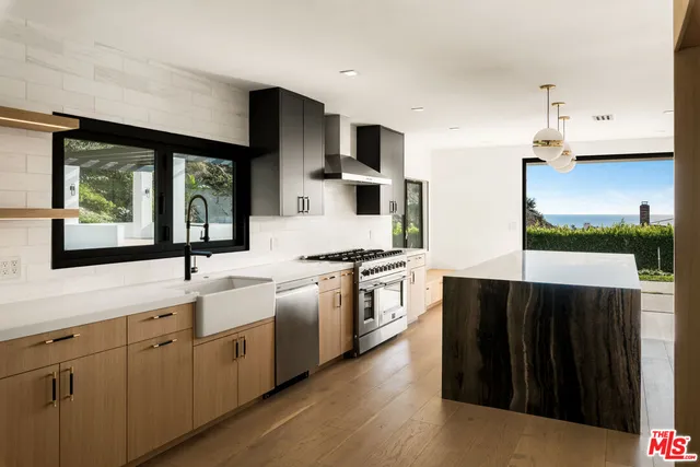 a view of swimming pool with an outdoor seating