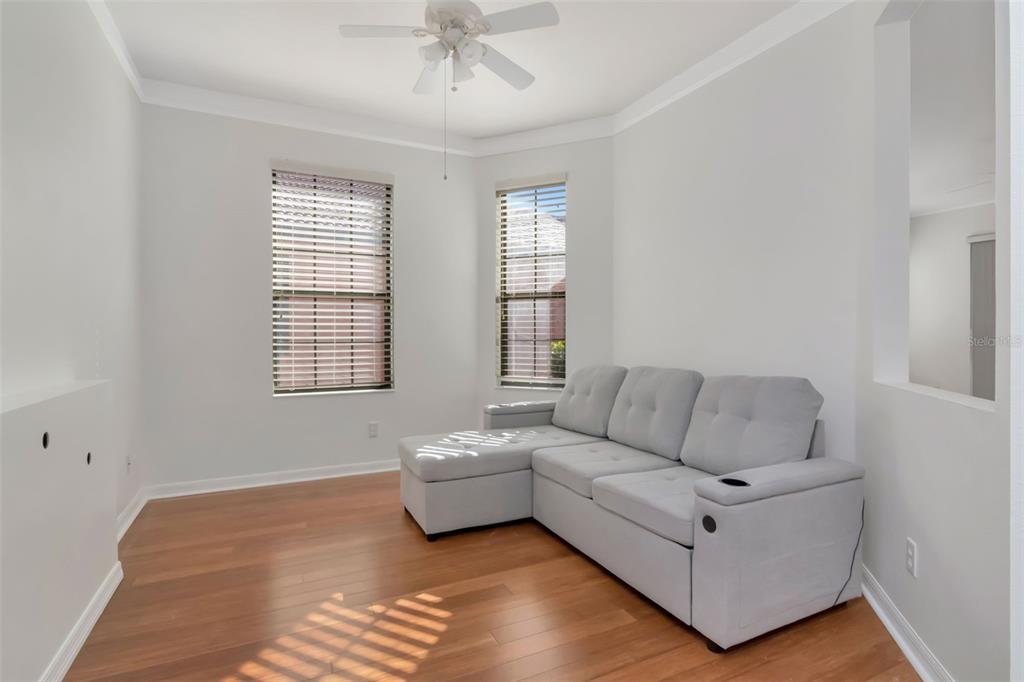 125 Shell Falls Drive Apollo Beach, FL 33572 - Photo 29 of 48 a living room with furniture and windows