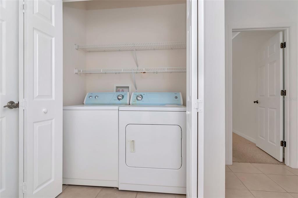 125 Shell Falls Drive Apollo Beach, FL 33572 - Photo 31 of 48 a utility room with dryer and washer