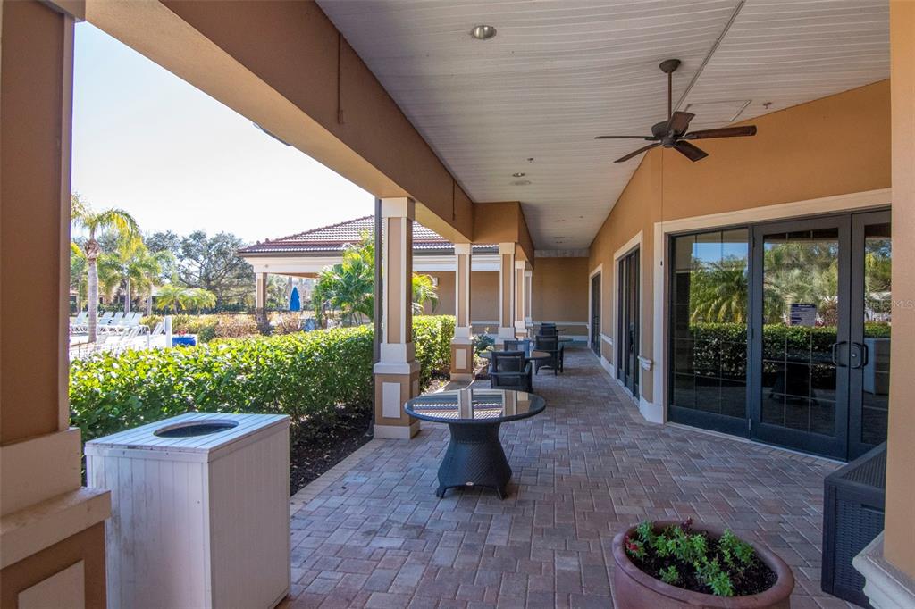 125 Shell Falls Drive Apollo Beach, FL 33572 - Photo 37 of 48 a view of a patio with couches chairs and potted plants