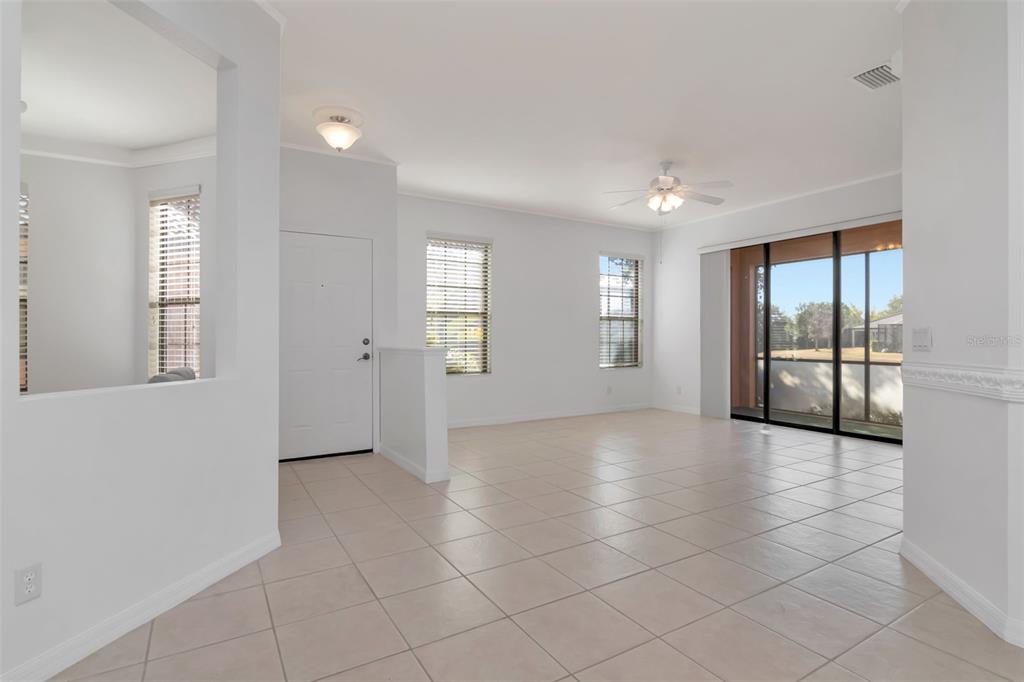 125 Shell Falls Drive Apollo Beach, FL 33572 - Photo 6 of 48 a view of an empty room with glass door