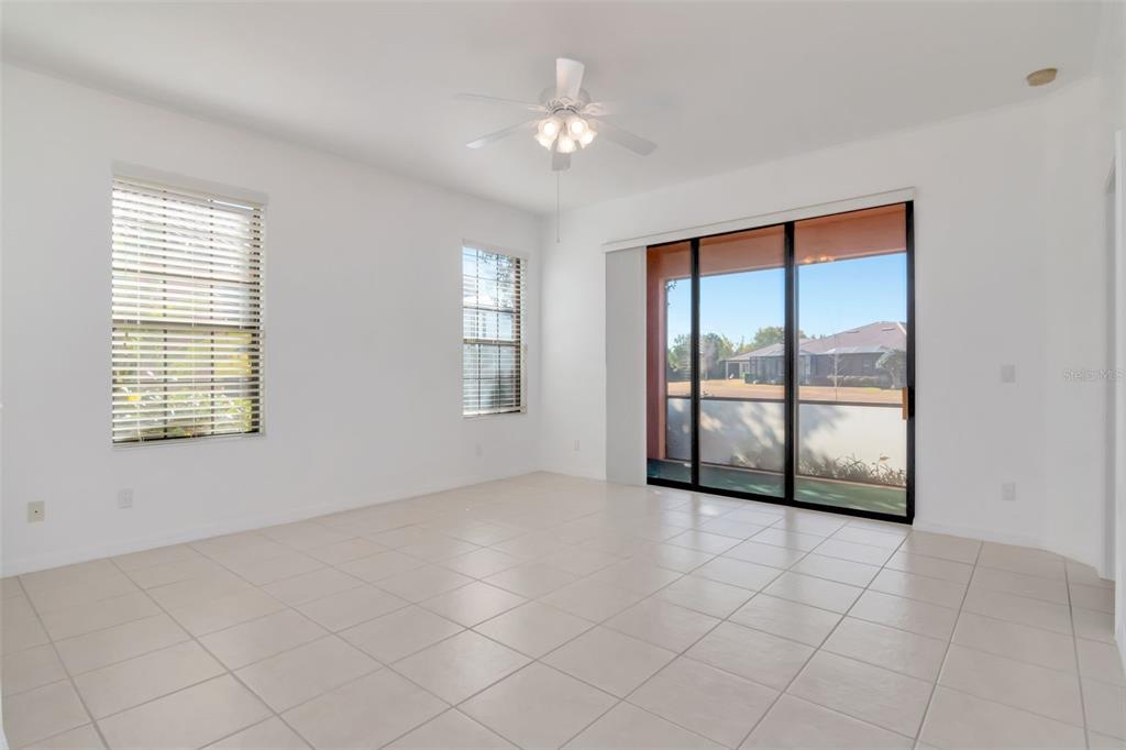 125 Shell Falls Drive Apollo Beach, FL 33572 - Photo 7 of 48 a view of an empty room with a window
