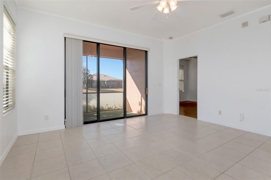 125 Shell Falls Drive Apollo Beach, FL 33572 - Photo 8 of 48 an empty room with windows and closet