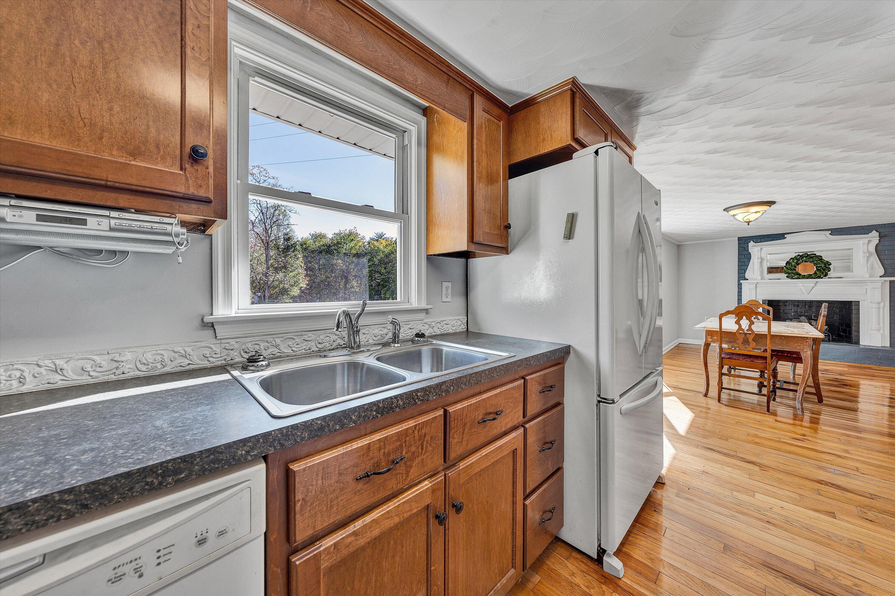 51 Mt Carmel Road Rocky Mount, VA 24151 - Photo 16 of 37 a kitchen with a sink and cabinets