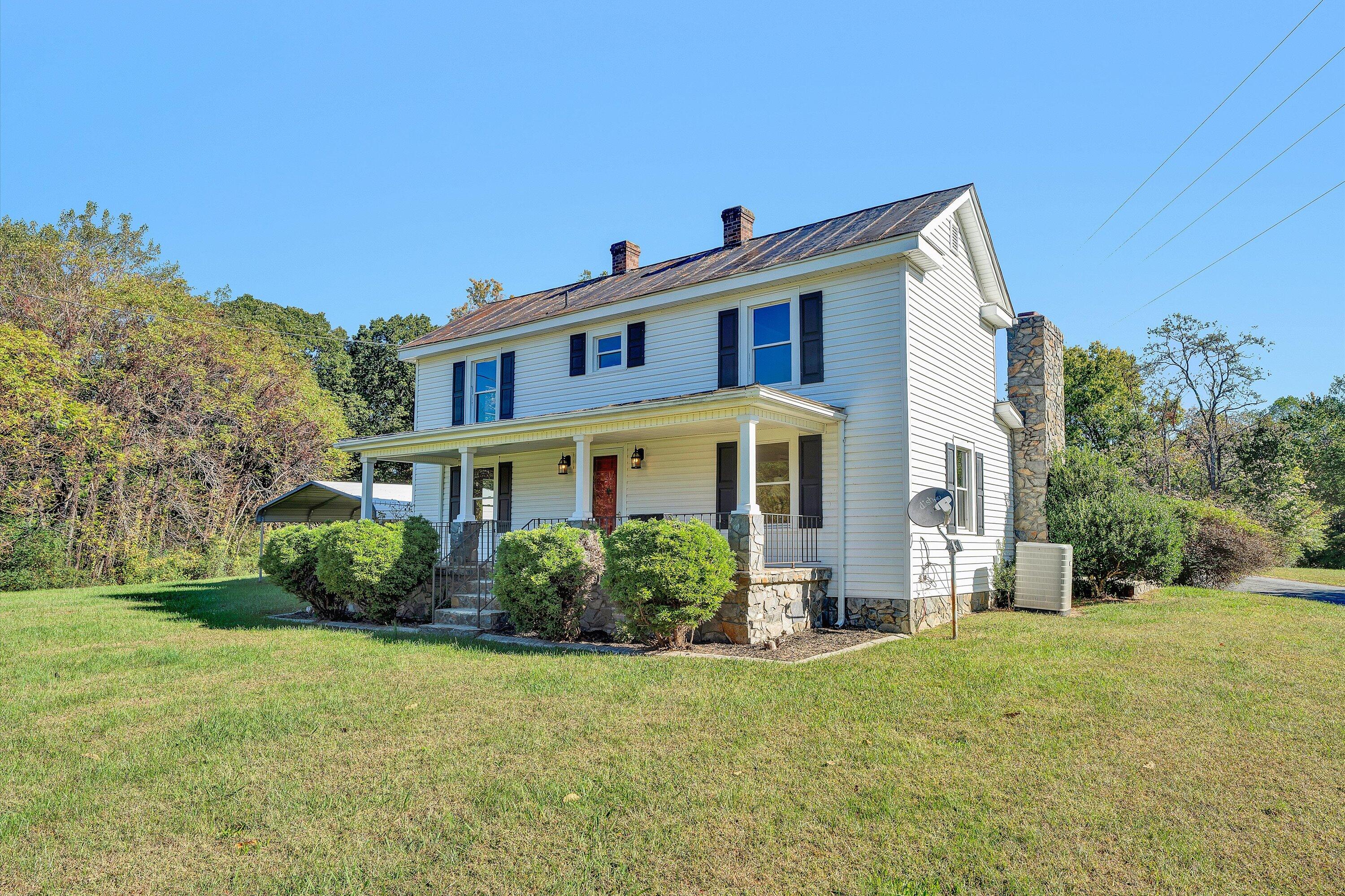 51 Mt Carmel Road Rocky Mount, VA 24151 - Photo 2 of 37 a front view of a house with a yard
