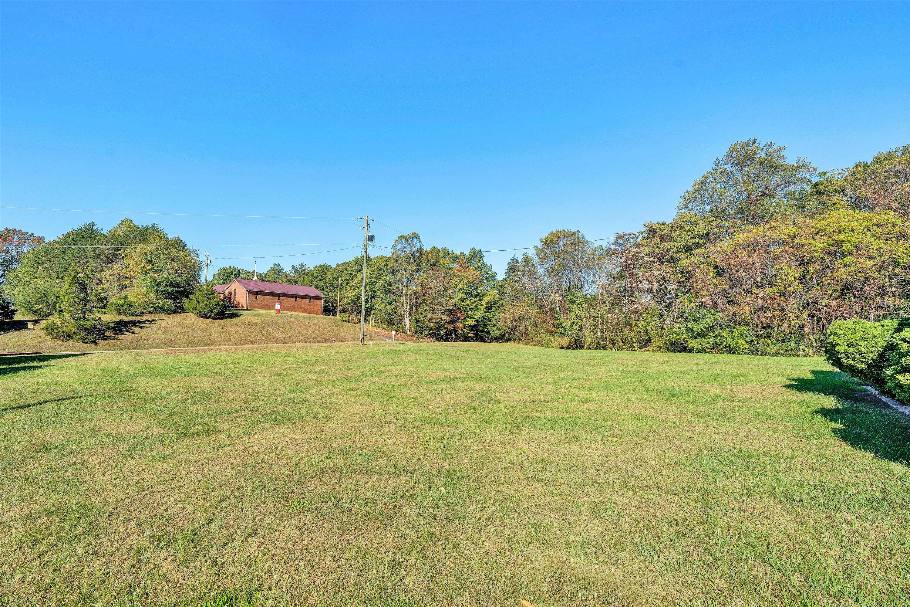 51 Mt Carmel Road Rocky Mount, VA 24151 - Photo 27 of 37 a view of a field of grass and trees