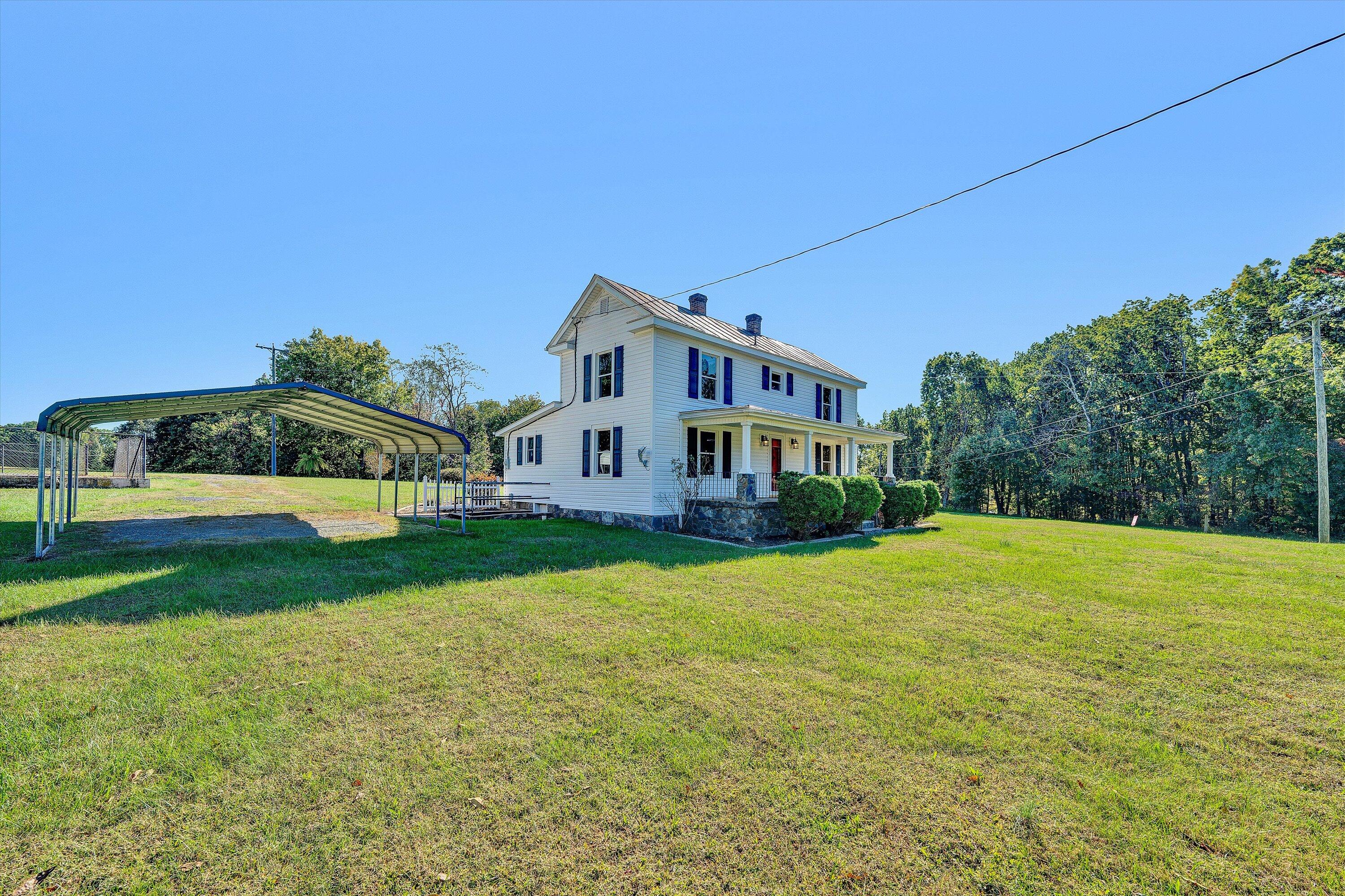 51 Mt Carmel Road Rocky Mount, VA 24151 - Photo 3 of 37 a house view with a garden space