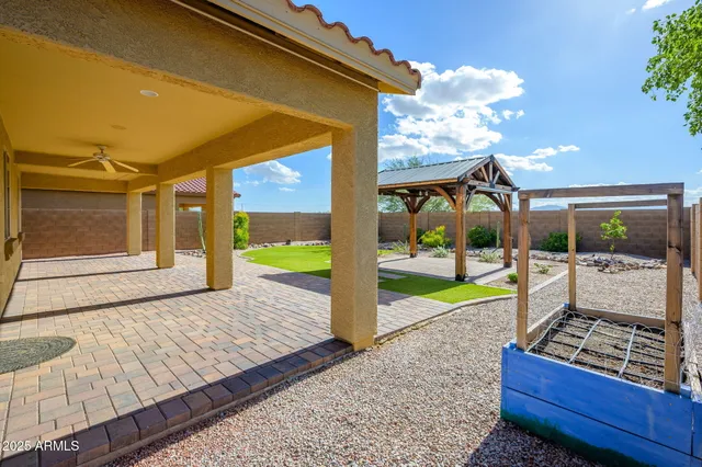 a view of an chairs and tables in the patio