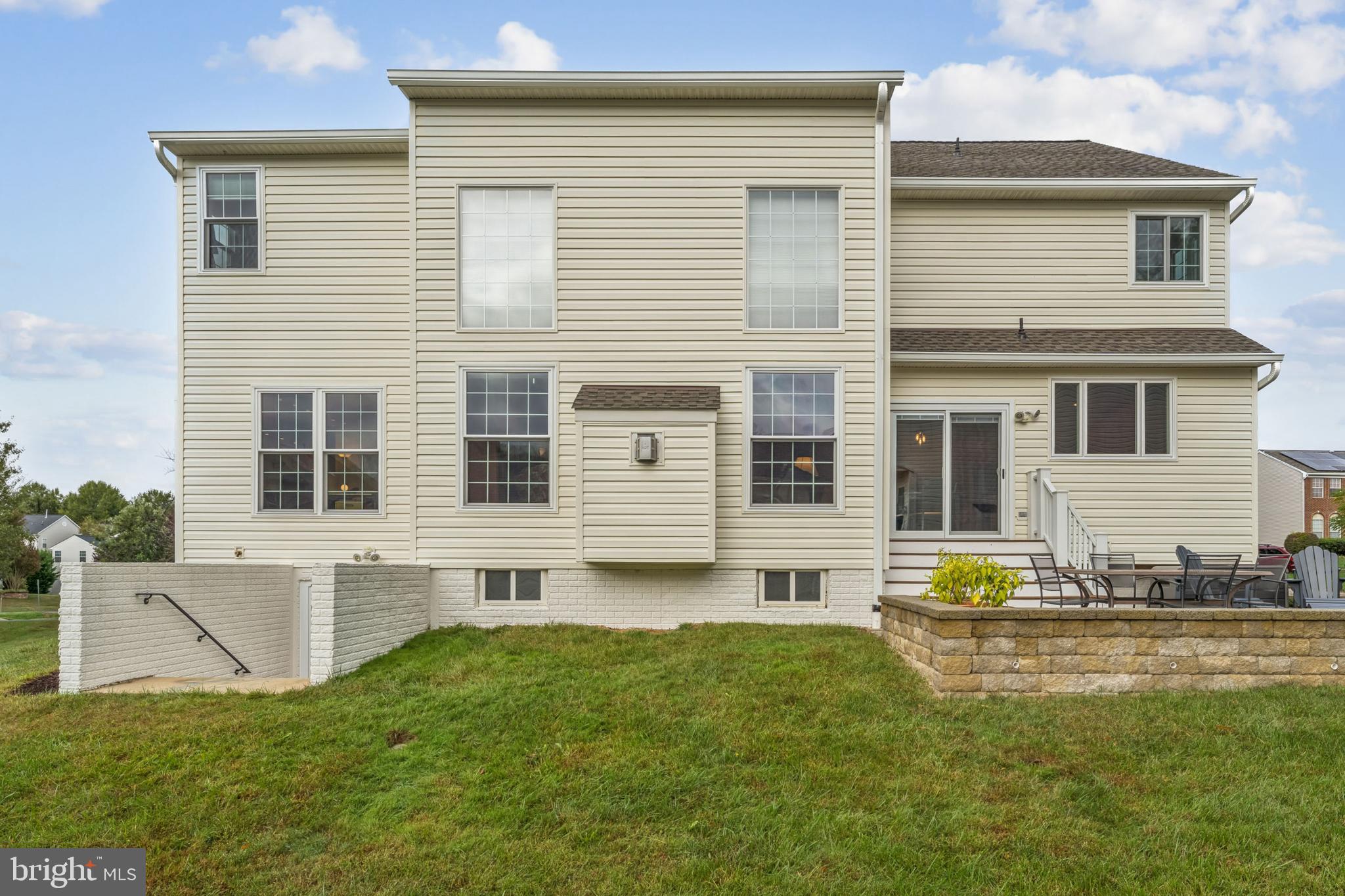 18423 Thundercloud Road Boyds, MD 20841 - Photo 52 of 58 a front view of house with yard and patio