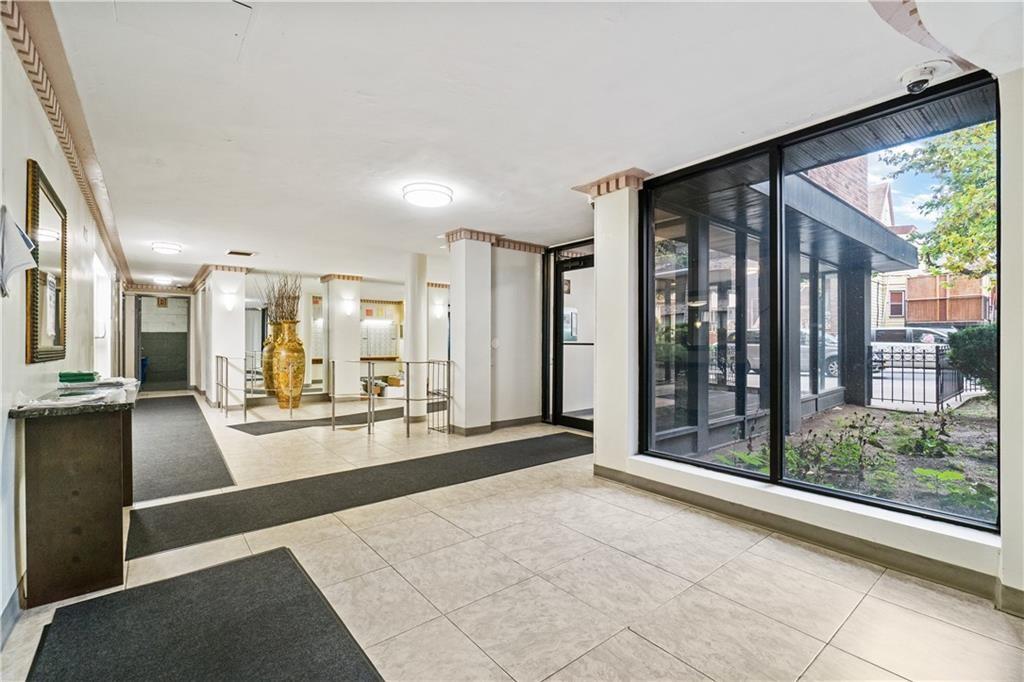 275 Webster Avenue, Unit 3A Brooklyn, NY 11230 - Photo 2 of 20 a view of a living room and entry way to kitchen
