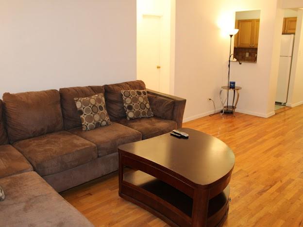 275 Webster Avenue, Unit 3A Brooklyn, NY 11230 - Photo 6 of 20 a living room with furniture