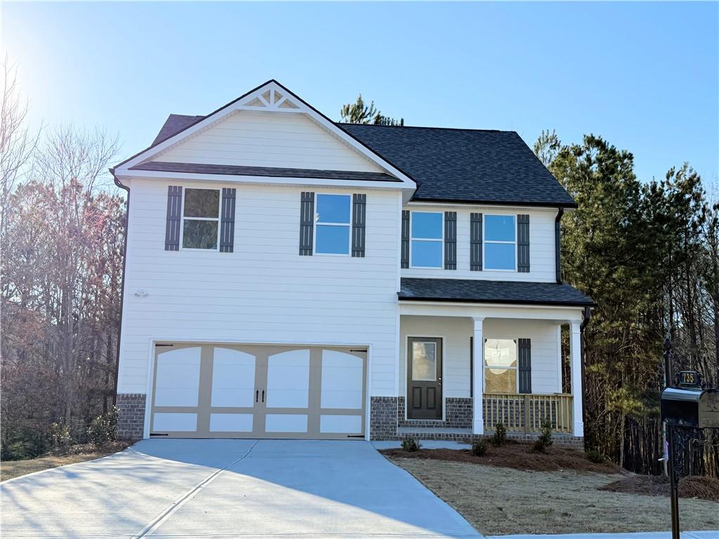 735 Cherokee Rose Bremen, GA 30110 - Photo 1 of 1 a front view of a house with a yard