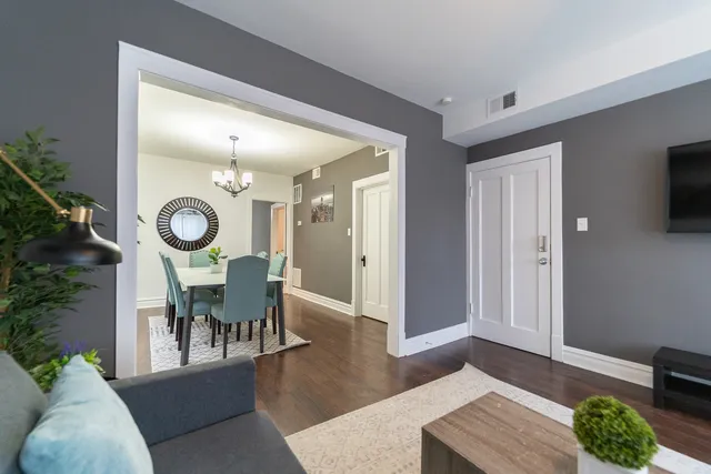 a living room with furniture and a table