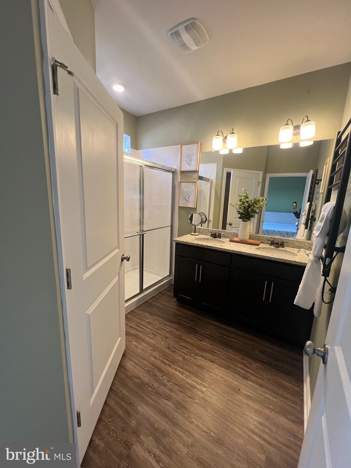 3106 Laurel Hill Road Hanover, MD 21076 - Photo 13 of 25 a bathroom with a double vanity sink and a mirror