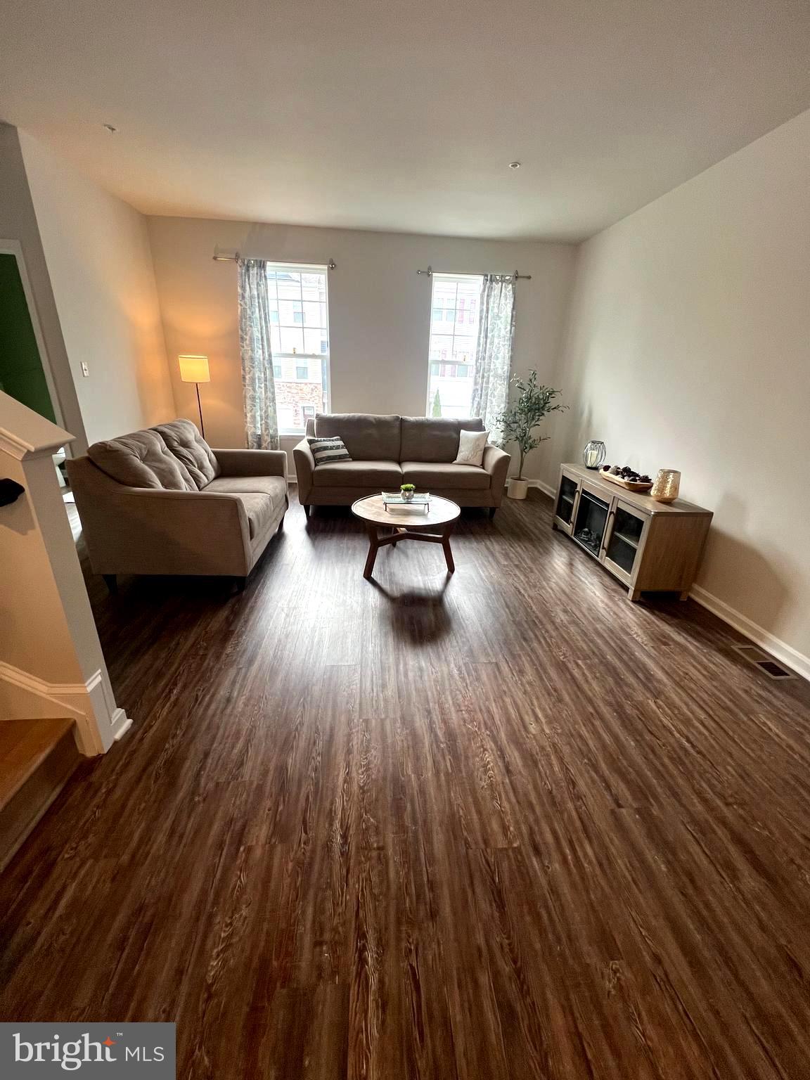 3106 Laurel Hill Road Hanover, MD 21076 - Photo 3 of 25 a living room with furniture and a wooden floor