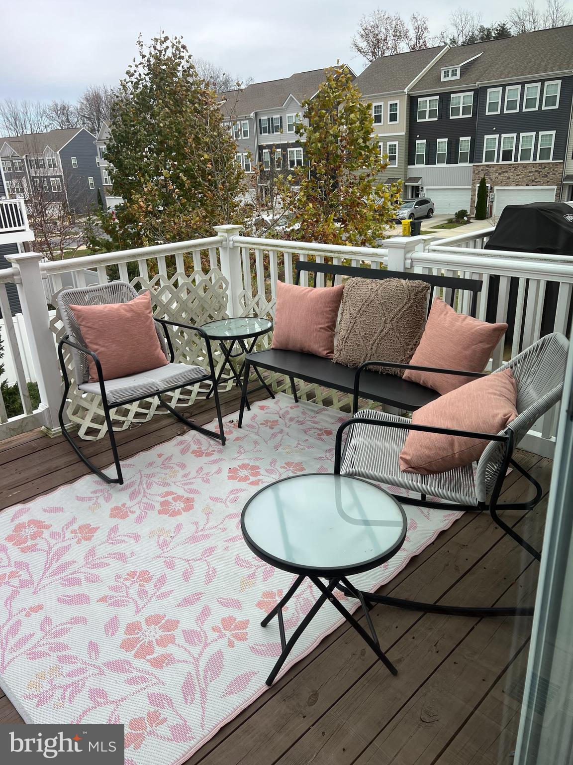 3106 Laurel Hill Road Hanover, MD 21076 - Photo 10 of 25 a balcony with table and chairs