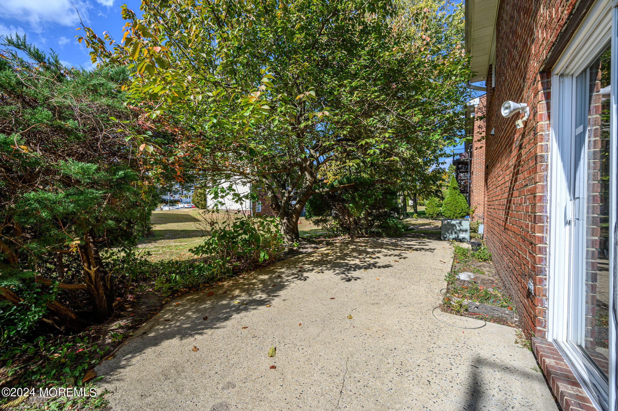 246 Sawmill Road, Unit 403 Brick, NJ 08724 - Photo 41 of 41 a pathway of a house with a yard