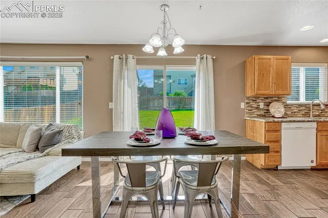 a bathroom with a sink a mirror and a toilet