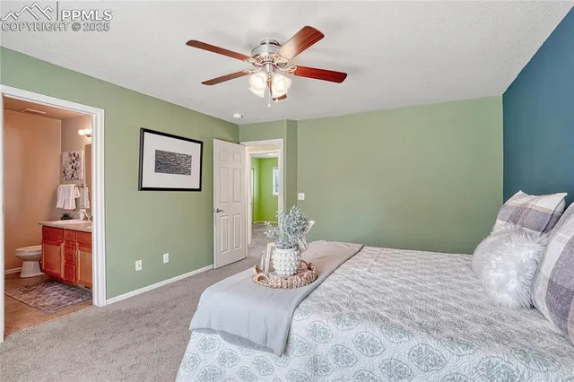 an empty room with a window and a dresser