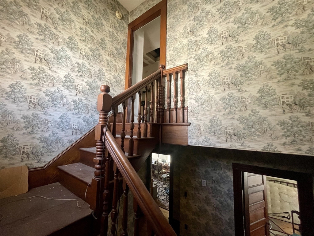 20 Rill Street Boston, MA 02125 - Photo 15 of 20 a view of balcony with wooden floor and stairs