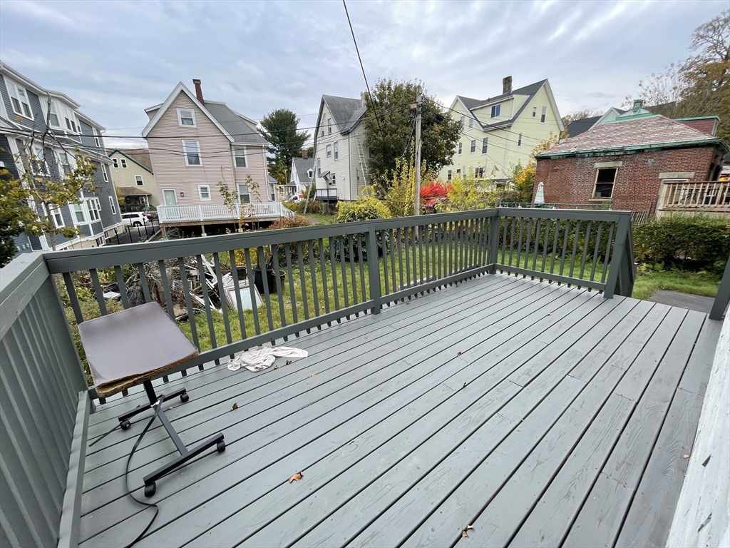 20 Rill Street Boston, MA 02125 - Photo 19 of 20 a view of a chairs and table on the wooden deck