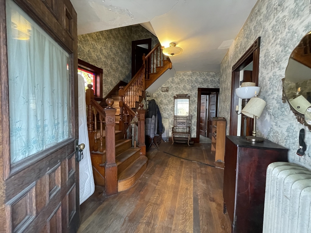 20 Rill Street Boston, MA 02125 - Photo 2 of 20 a view of a livingroom with furniture and hardwood floor