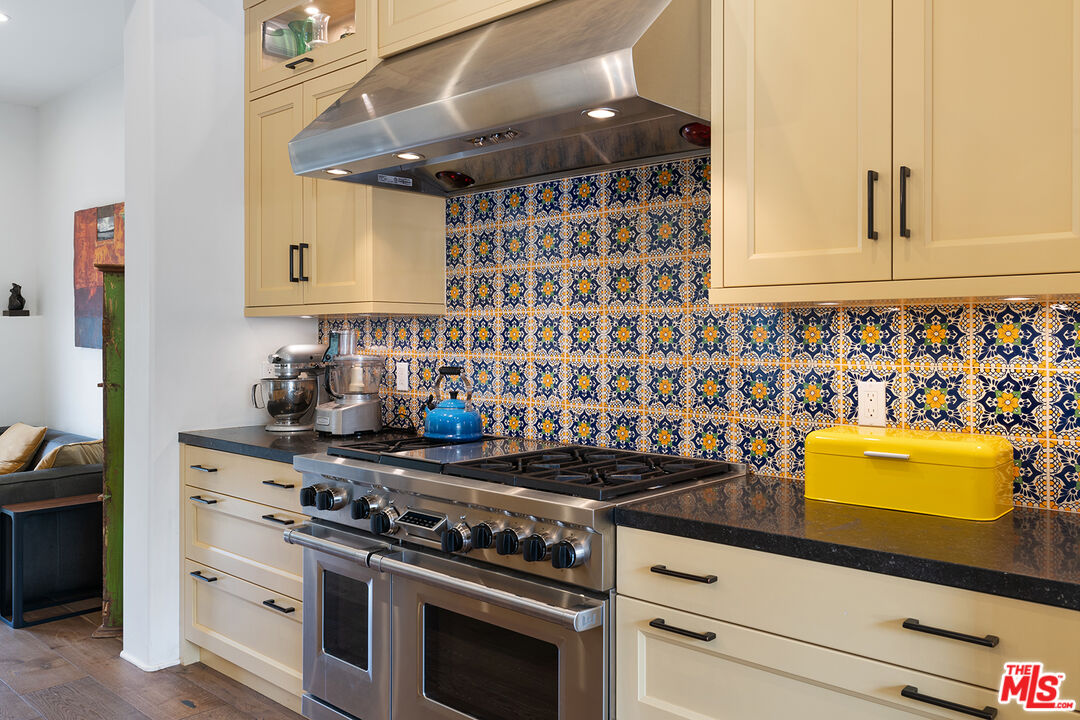 2382 Live Oak Meadows Road Malibu, CA 90265 - Photo 14 of 50 a kitchen with a stove and a cabinet