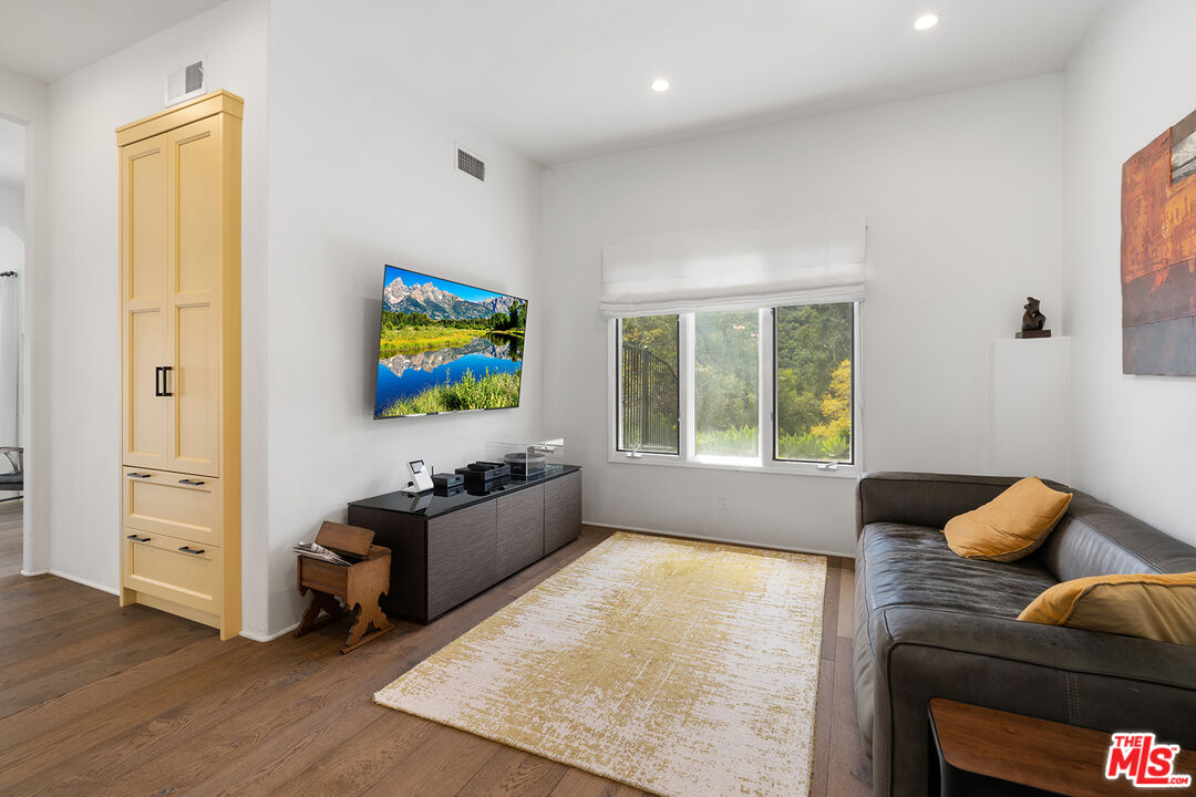 2382 Live Oak Meadows Road Malibu, CA 90265 - Photo 21 of 50 a bedroom with furniture and a window