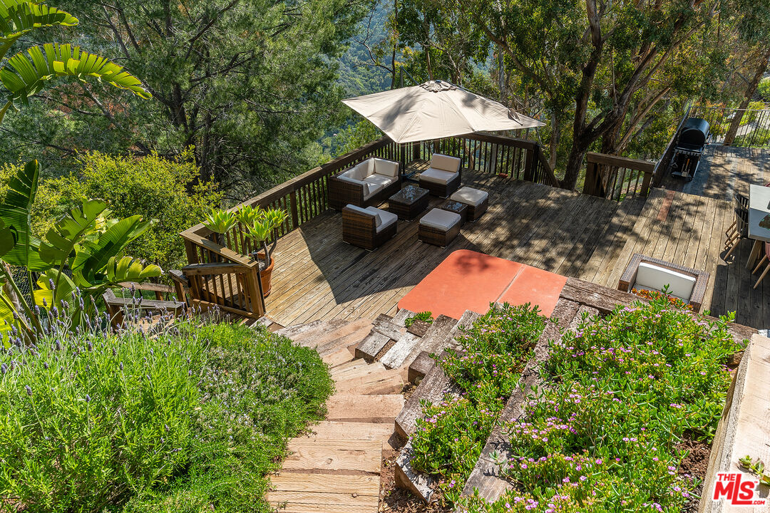 2382 Live Oak Meadows Road Malibu, CA 90265 - Photo 38 of 50 a view of a backyard with sitting area