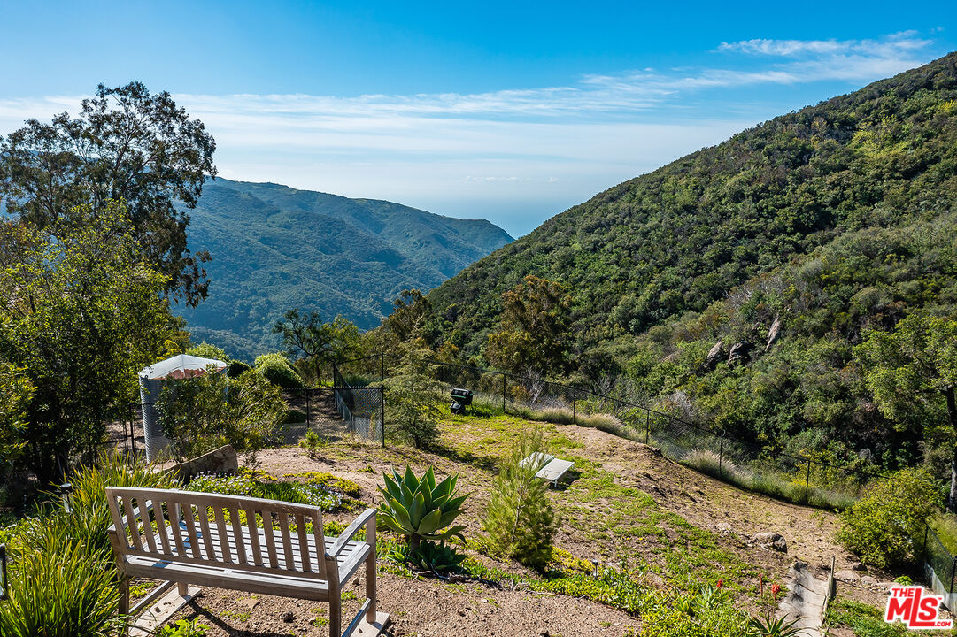 2382 Live Oak Meadows Road Malibu, CA 90265 - Photo 44 of 50 a view of a balcony with an outdoor space