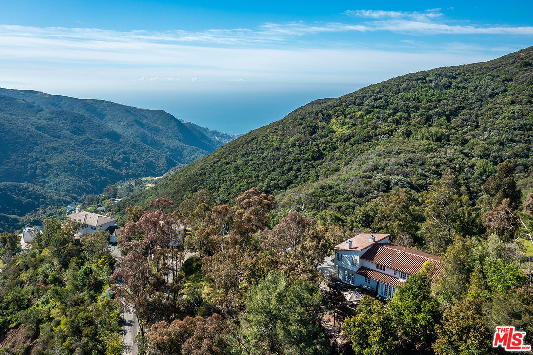 2382 Live Oak Meadows Road Malibu, CA 90265 - Photo 45 of 50 a view of a field with an ocean view