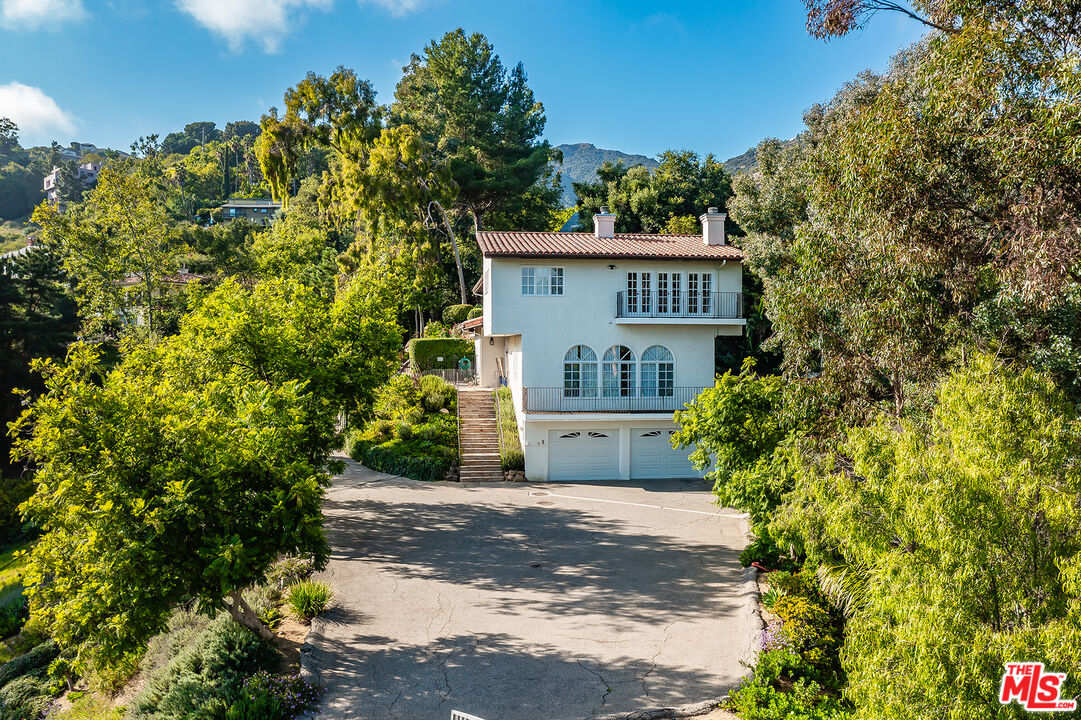 2382 Live Oak Meadows Road Malibu, CA 90265 - Photo 50 of 50 a view of a house with a tree