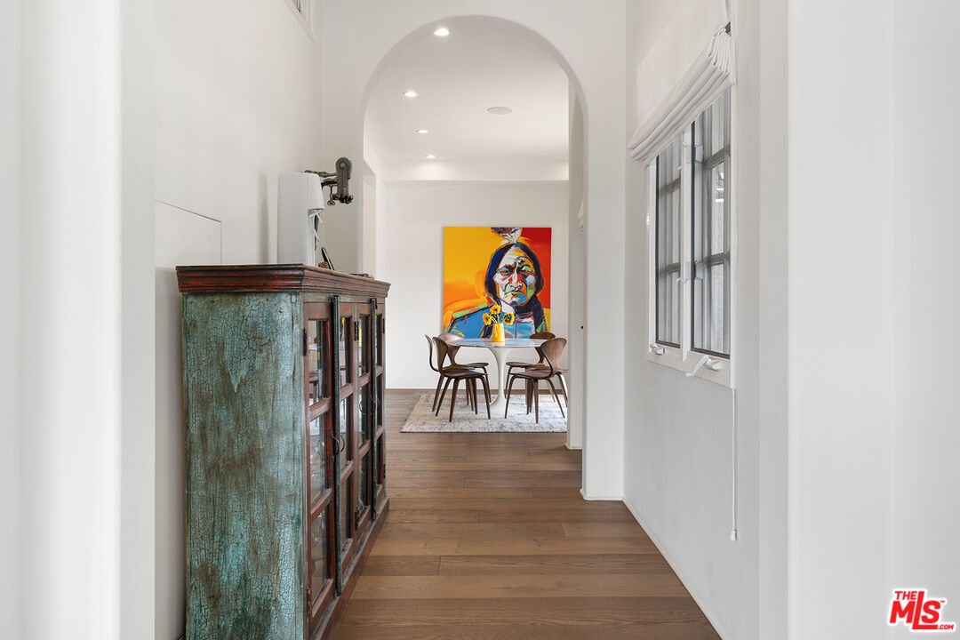 2382 Live Oak Meadows Road Malibu, CA 90265 - Photo 9 of 50 a view of a hallway with wooden floor and windows