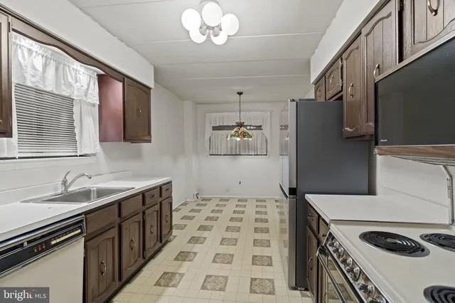 a room with window and walk in closet