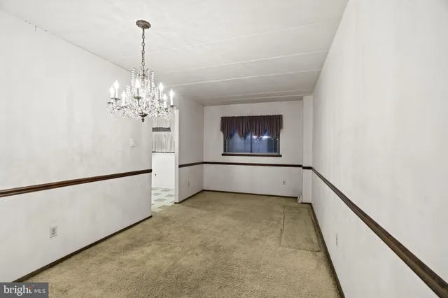 a view of a livingroom with a staircase