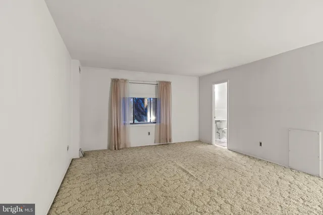 a view of room with hardwood floor