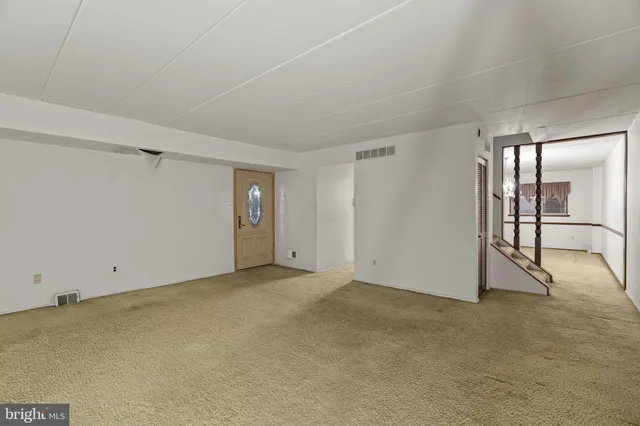 a kitchen with a refrigerator sink and stove