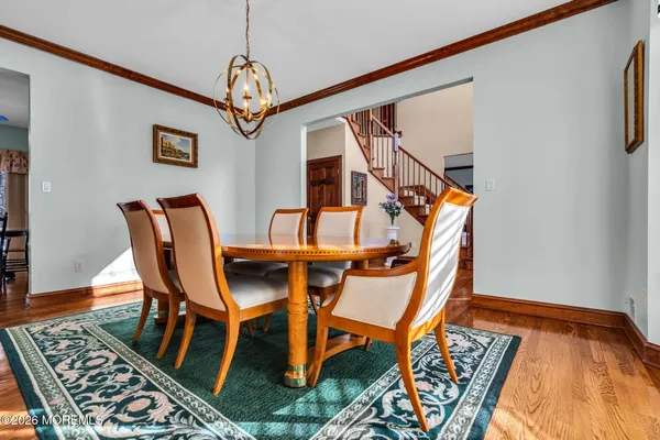 a kitchen with stainless steel appliances granite countertop a sink a microwave oven a stove and a microwave
