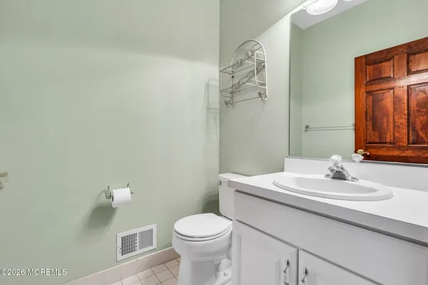 a view of empty room with an entryway