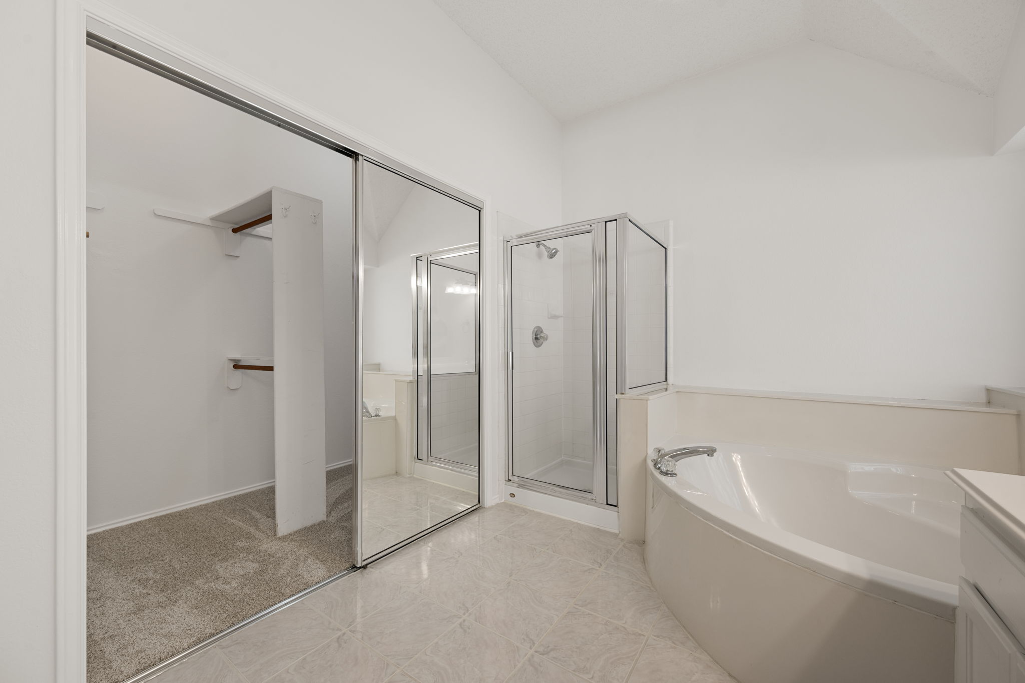 707 Ridge View Drive Leander, TX 78641 - Photo 26 of 40 a bathroom with a bathtub and a shower