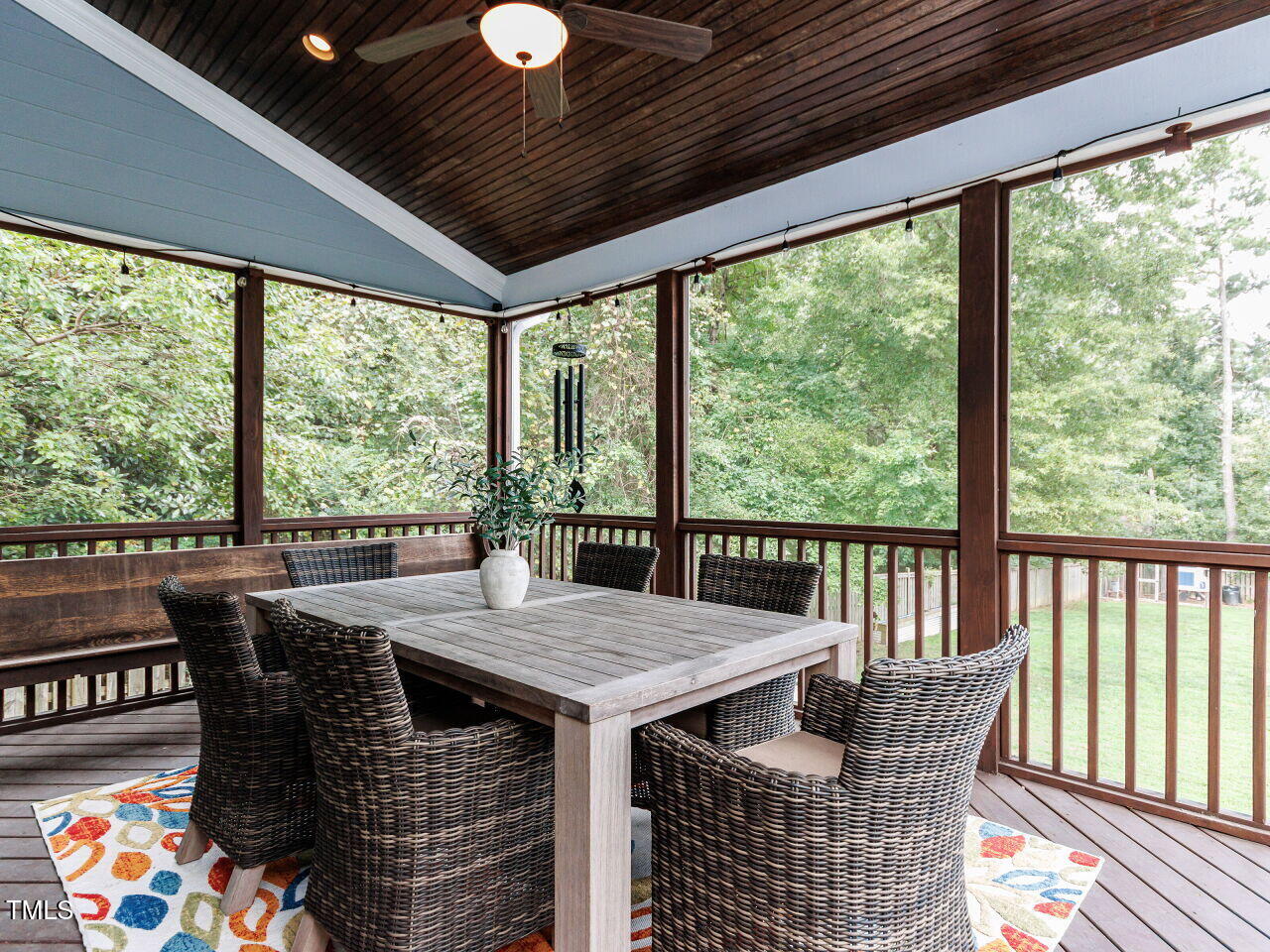 802 Lynn Road Durham, NC 27703 - Photo 34 of 41 Spectacular screened porch with vaulted ceiling overlooking the huge fenced in landscaped backyard.