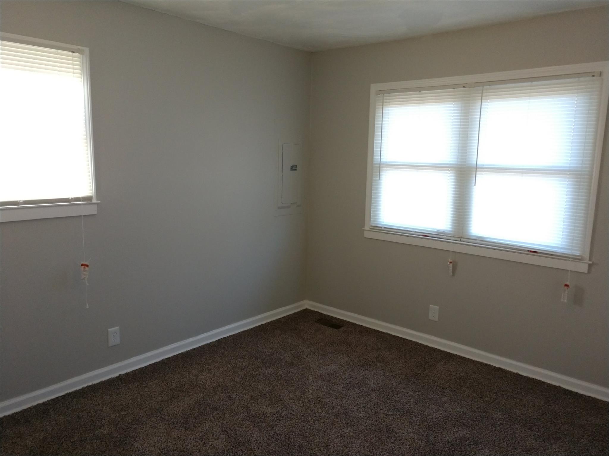 1240 Black Road Cunningham, TN 37052 - Photo 8 of 12 an empty room with a window