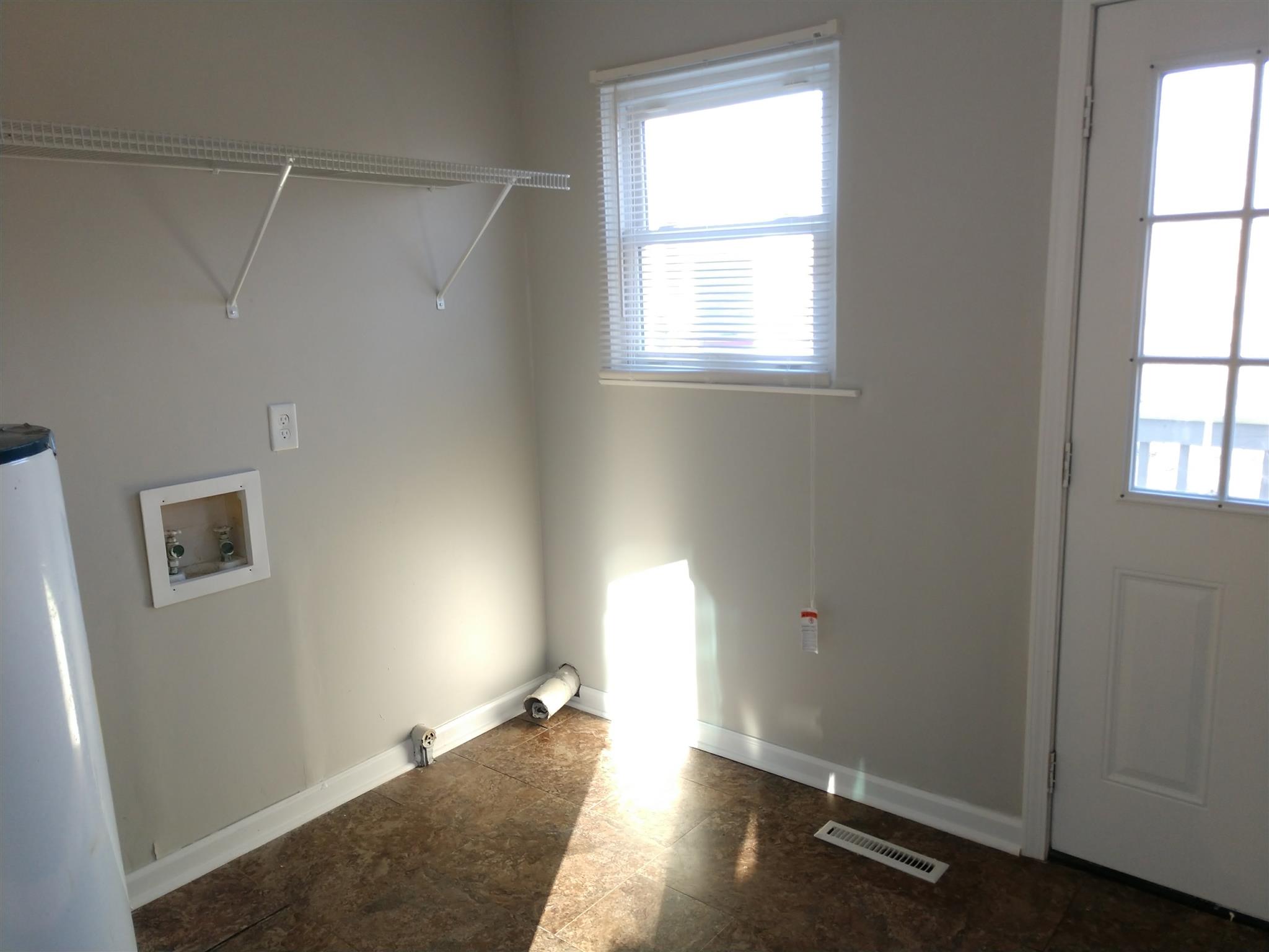 1240 Black Road Cunningham, TN 37052 - Photo 10 of 12 an empty room with windows