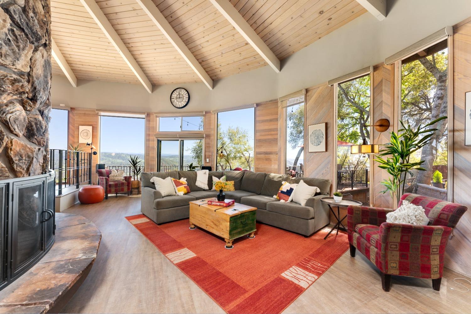 5161 Coyote Pass Road Shingle Springs, CA 95682 - Photo 17 of 48 a living room with furniture and a large window