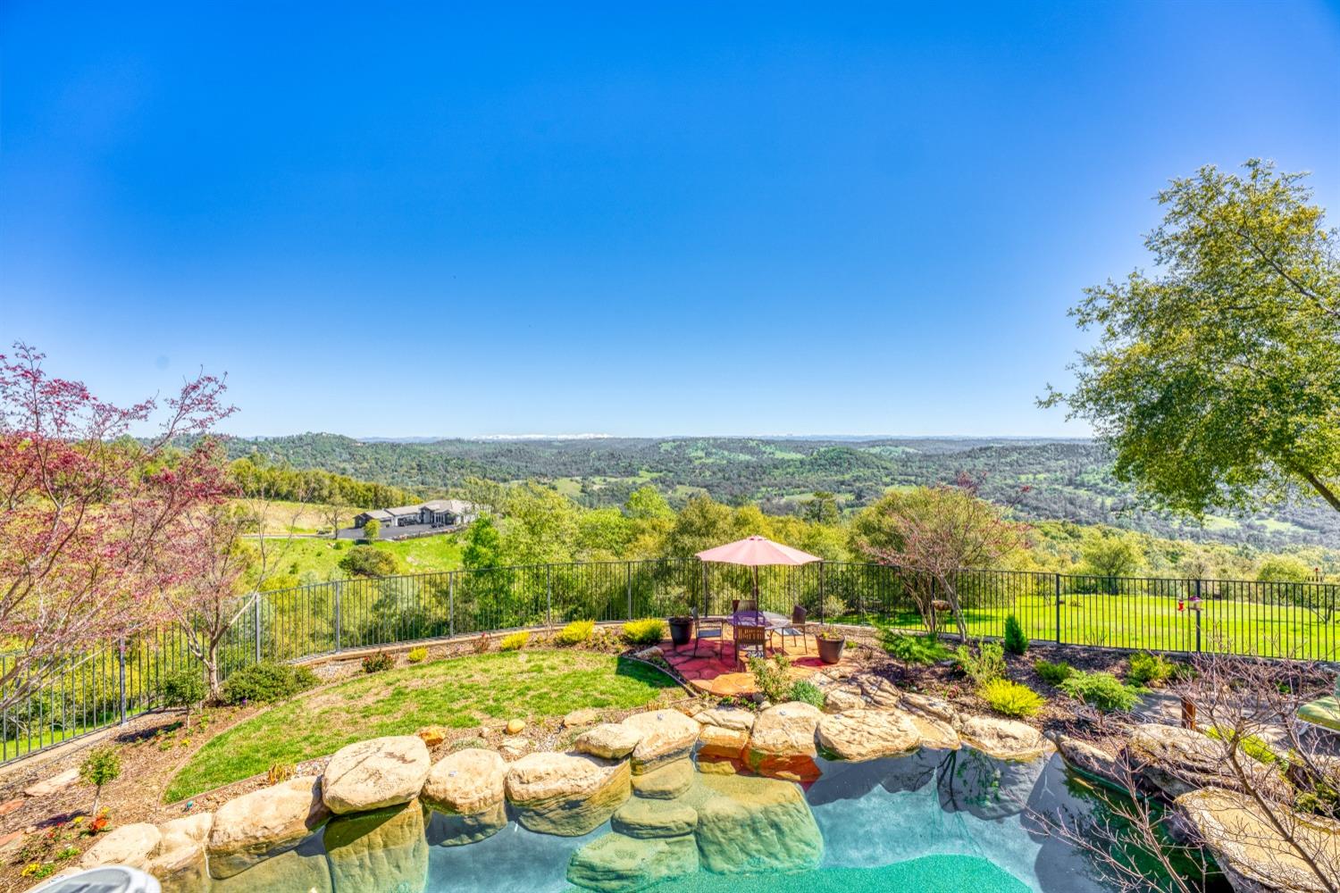5161 Coyote Pass Road Shingle Springs, CA 95682 - Photo 24 of 48 a view of a city with an ocean view