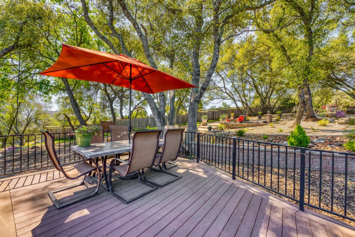 5161 Coyote Pass Road Shingle Springs, CA 95682 - Photo 35 of 48 a view of a deck with furniture and yard